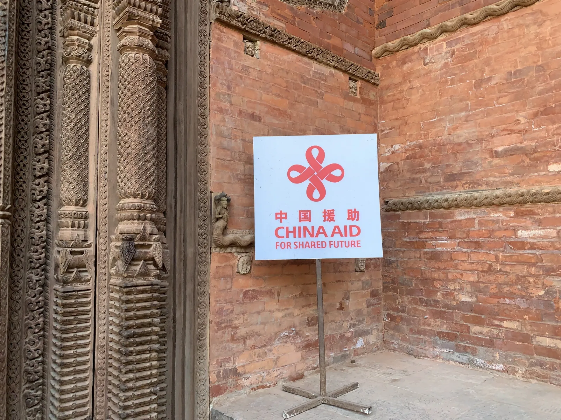 "CHINA AIDS FOR SHARED FUTURE" sign at Hanuman Dhoka, Kathmandu, Nepal (2023)
