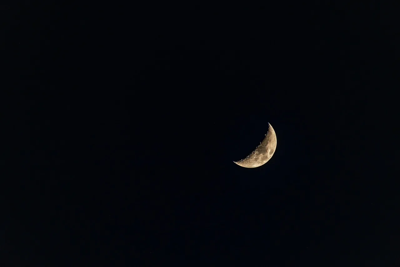 Moon Half Moon in SKy from Earth