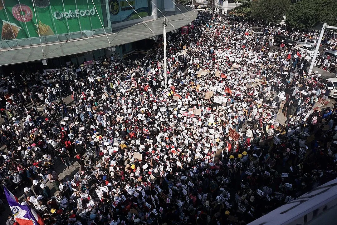 Thousands of protesters participate in an anti-military rally in Yangon.

