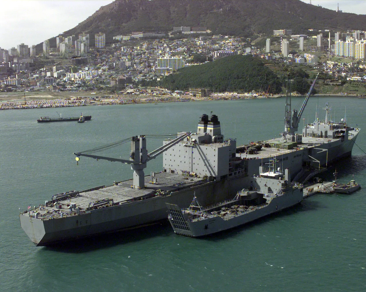 USA Military - US Naval Ship Pollux (T-AKR-290) anchored_in_the_harbor_off_the_Port_of_Pusan,_Republic_of_Korea_-_19_Oct._1998