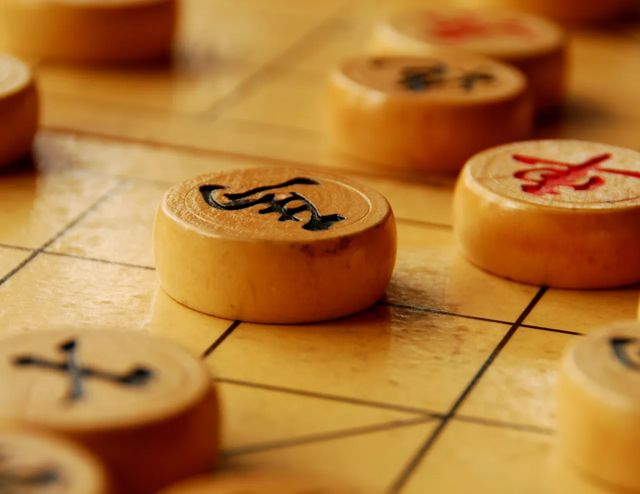 Xiangqi, or Chinese chess board with pieces